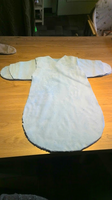 Geknipte slaapzak onderdelen samengelegd om te controleren of alles past