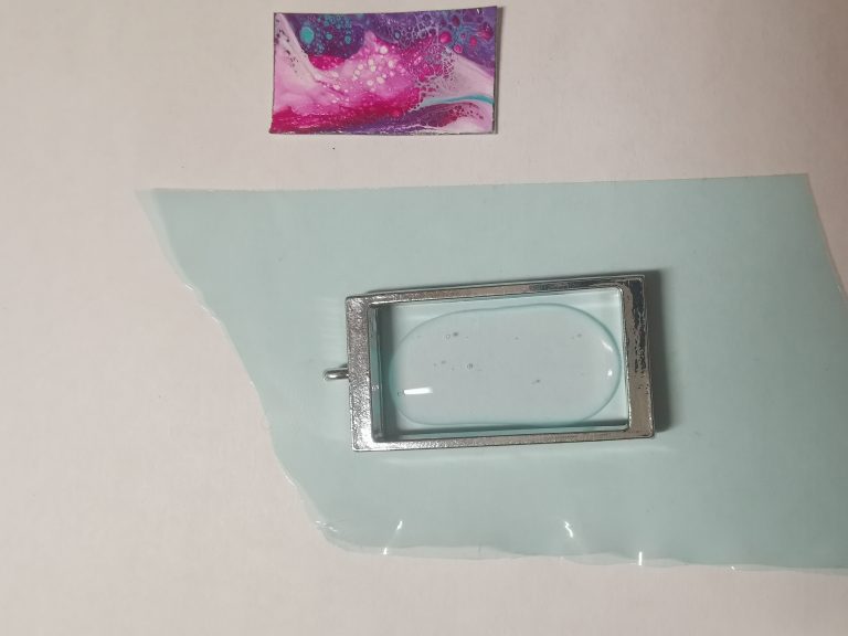 Pendant frame with UV resin on resin tape