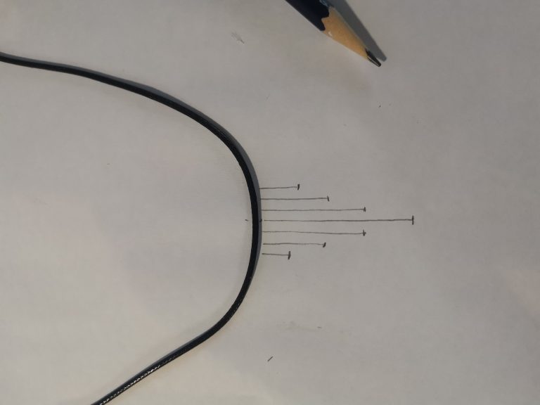 Schets met draadlengtes voor hangerontwerp