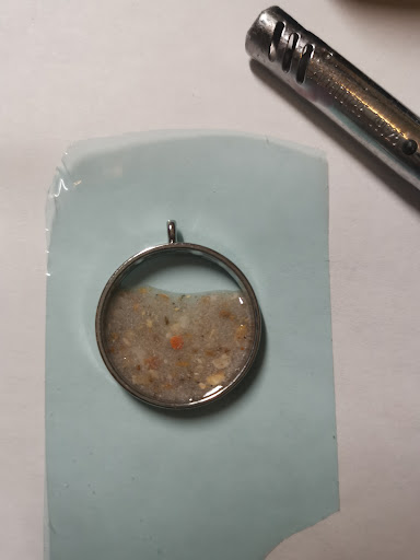 Hangerframe met aangebrachte zandlaag