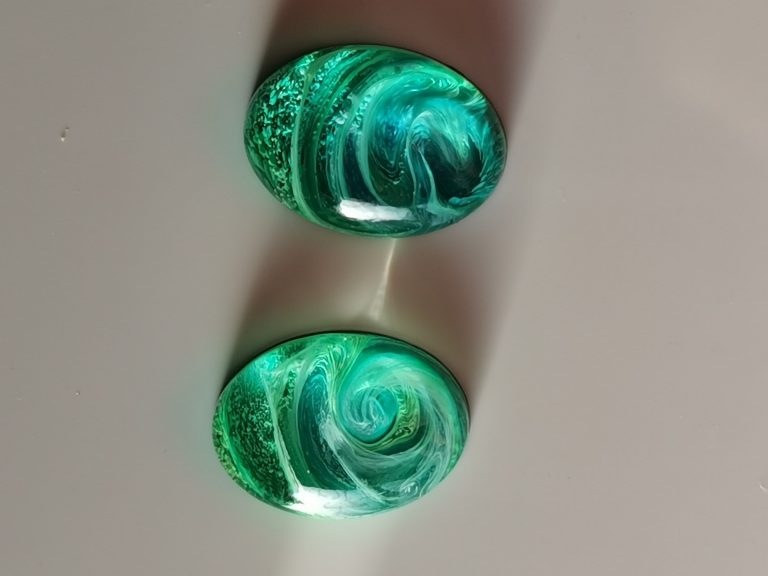Two oval petri cabochons in emerald green, mint and white