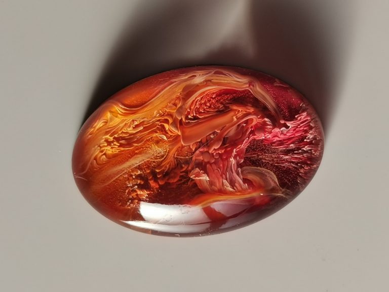 Oval petri cabochon in fire orange, red and burgundy