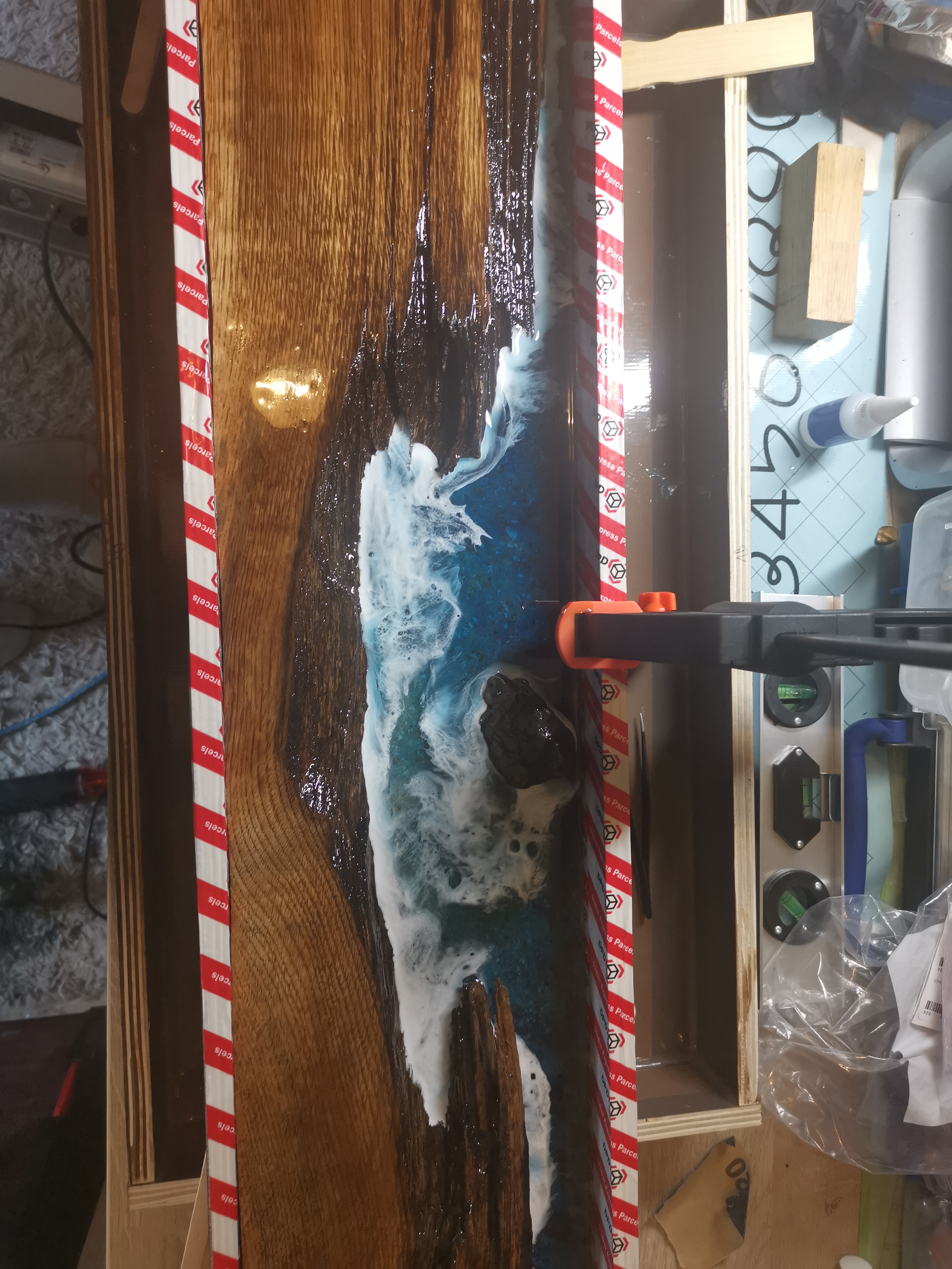 Epoxy messenblok: golven vormen met heatgun en alcoholspray